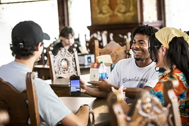 Students hanging out in the dining hall