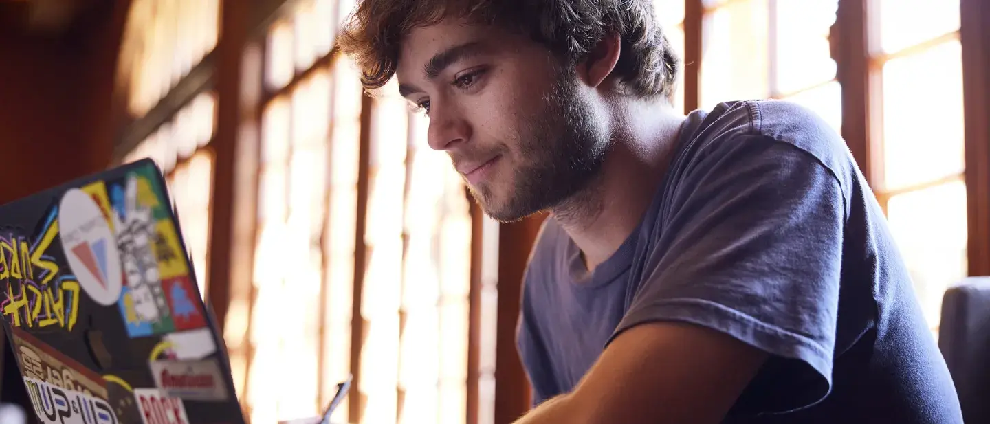 Student studying in Ponce Hall