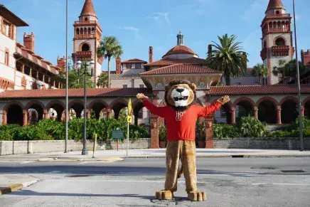 Lewis the Lion posing in front of the Ponce gates