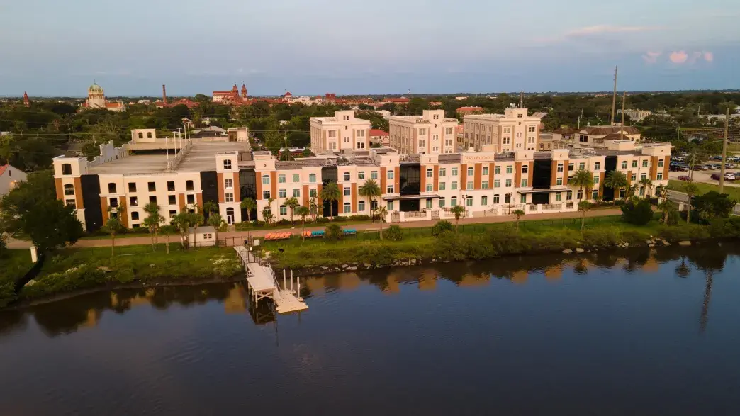 Abare Hall features a dock with kayaks and fishing equipment.