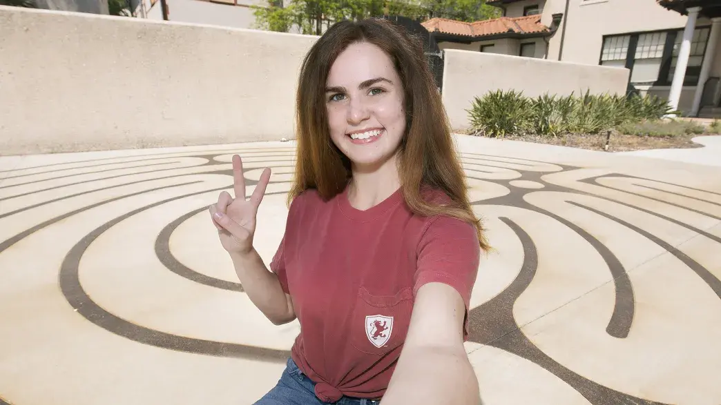 Student hanging out in the contemplation garden