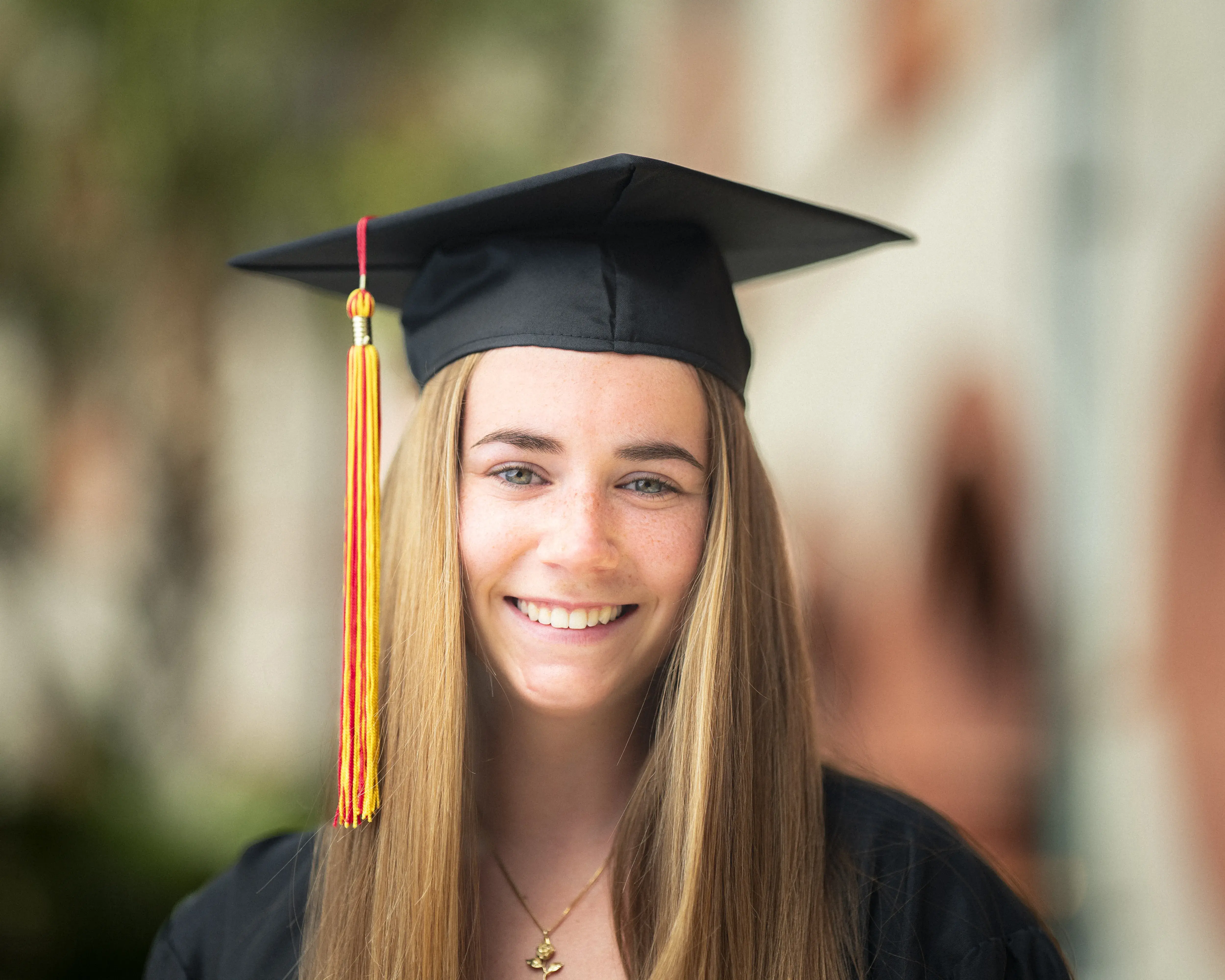 Close-up of Shaw in cap & gown